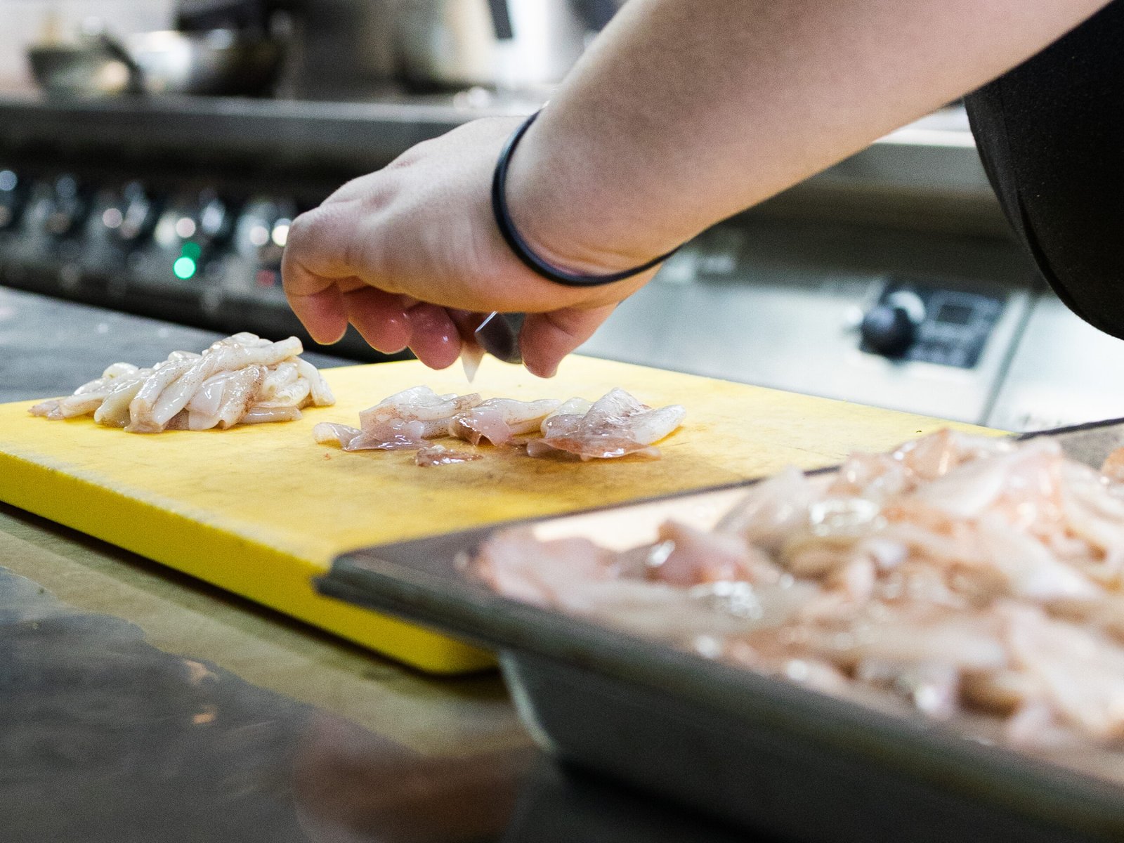 Cleaning and cutting the squid